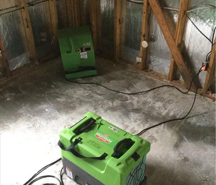 air scrubbers placed on a concrete floor
